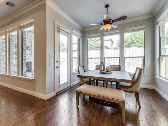 114 Crestbrook Dr, Rockwall, TX 75087 - dining space featuring dark wood finished floors, baseboards, a ceiling fan, and crown molding