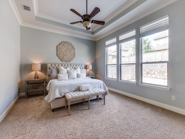114 Crestbrook Dr, Rockwall, TX 75087 - carpeted bedroom with a tray ceiling, crown molding, baseboards, and ceiling fan