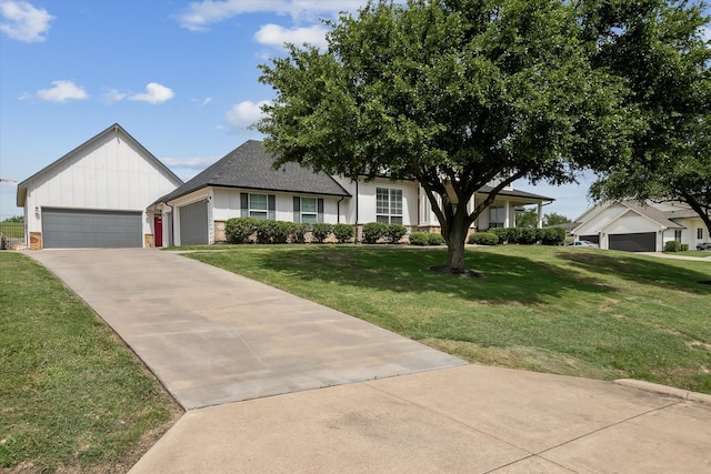 10601 Los Rios Dr, Fort Worth, TX 76179 - view of front of property with a front yard and board and batten siding