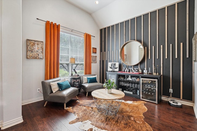 10601 Los Rios Dr, Fort Worth, TX 76179 - living area with lofted ceiling, a dry bar, baseboards, and wood finished floors