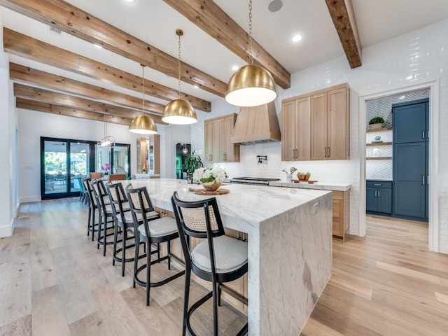620 Redwood Creek Dr, Fairview, TX 75069 - kitchen featuring light wood finished floors, decorative backsplash, light brown cabinetry, baseboards, and beamed ceiling
