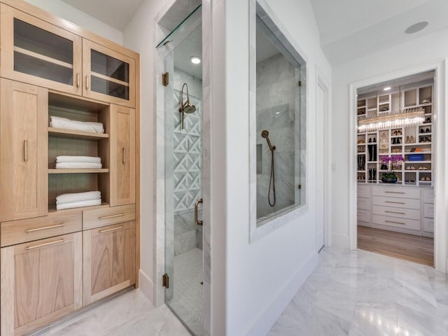 620 Redwood Creek Dr, Fairview, TX 75069 - bathroom featuring a shower stall, marble finish floors, and a walk in closet