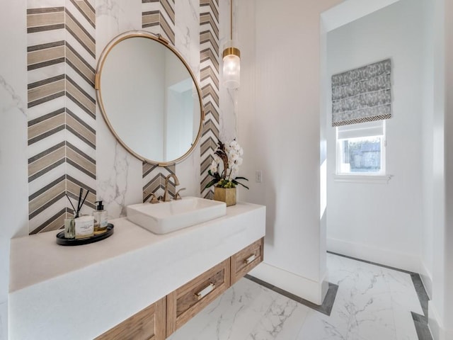 620 Redwood Creek Dr, Fairview, TX 75069 - bathroom featuring marble look tiles, baseboards, and vanity