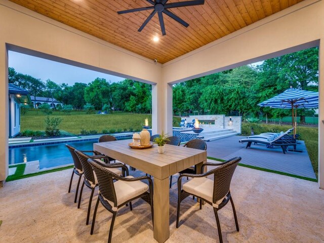620 Redwood Creek Dr, Fairview, TX 75069 - view of patio with a ceiling fan, an outdoor pool, and outdoor dining area