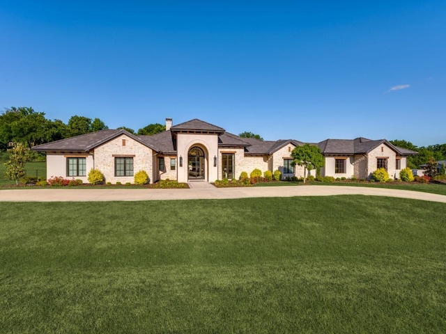 620 Redwood Creek Dr, Fairview, TX 75069 - mediterranean / spanish-style house with a chimney, a front yard, and curved driveway