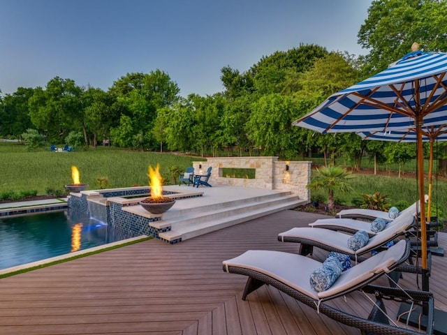 620 Redwood Creek Dr, Fairview, TX 75069 - wooden deck with an outdoor fire pit and view of wooded area