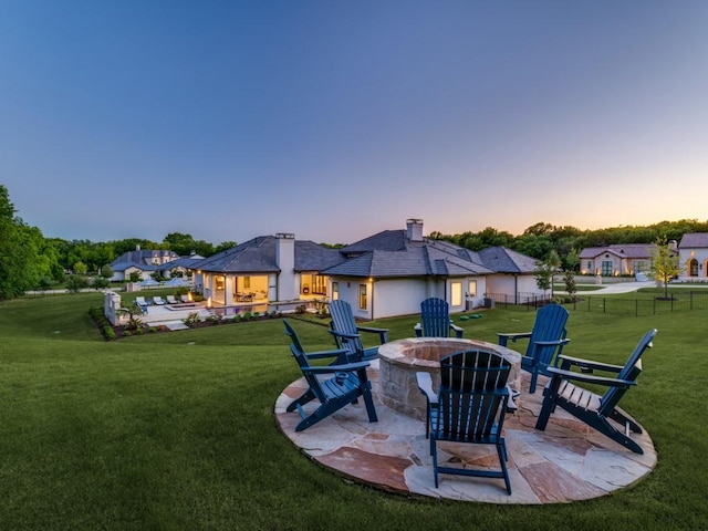 620 Redwood Creek Dr, Fairview, TX 75069 - yard at dusk featuring a fire pit and a patio