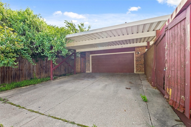 garage with fence