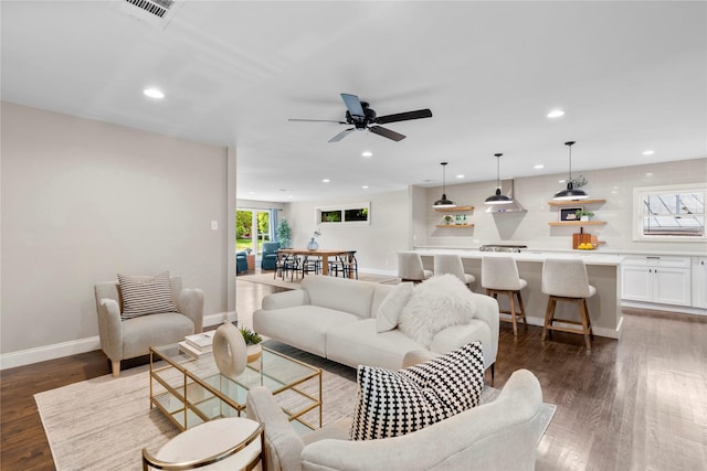 9031 Fringewood Dr, Dallas, TX 75228 - living room with ceiling fan, recessed lighting, and dark wood-type flooring