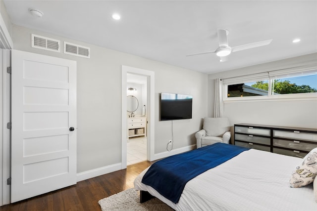 9031 Fringewood Dr, Dallas, TX 75228 - bedroom with wood finished floors, baseboards, recessed lighting, ceiling fan, and ensuite bath