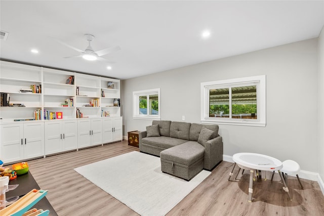 9031 Fringewood Dr, Dallas, TX 75228 - living area with light wood-style floors, ceiling fan, baseboards, and recessed lighting