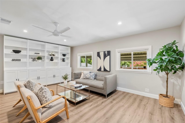 9031 Fringewood Dr, Dallas, TX 75228 - living area with light wood-style flooring, a ceiling fan, and recessed lighting