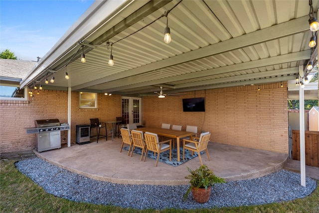 9031 Fringewood Dr, Dallas, TX 75228 - view of patio with french doors, grilling area, fence, wine cooler, and ceiling fan