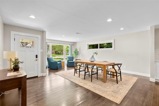 9031 Fringewood Dr, Dallas, TX 75228 - dining space featuring dark wood-style flooring and recessed lighting
