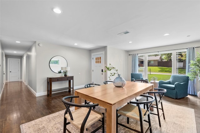 9031 Fringewood Dr, Dallas, TX 75228 - dining room with recessed lighting and wood finished floors