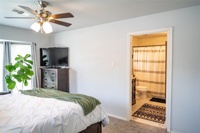 710 Melrose Dr, Richardson, TX 75080 - bedroom with carpet flooring, connected bathroom, and baseboards