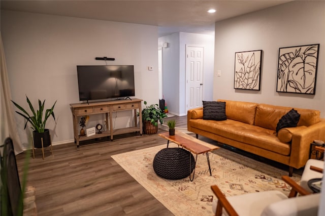 710 Melrose Dr, Richardson, TX 75080 - living area with wood finished floors, recessed lighting, and baseboards