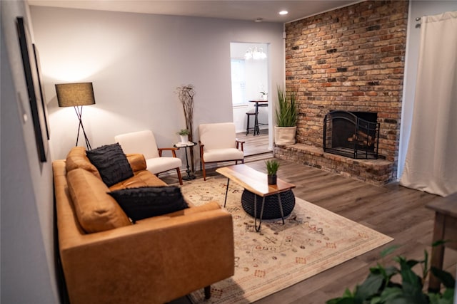 710 Melrose Dr, Richardson, TX 75080 - living room featuring recessed lighting, a fireplace, and wood finished floors