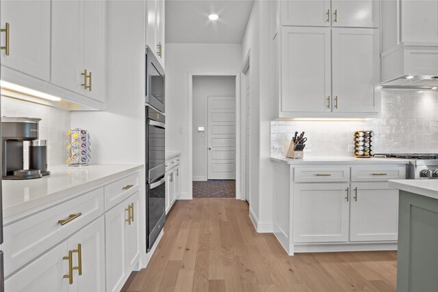 14524 Capridge Rd, Aledo, TX 76008 - kitchen with light countertops, backsplash, stainless steel microwave, white cabinets, and recessed lighting