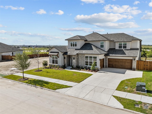 14524 Capridge Rd, Aledo, TX 76008 - view of front of property featuring stucco siding, concrete driveway, stone siding, and a garage