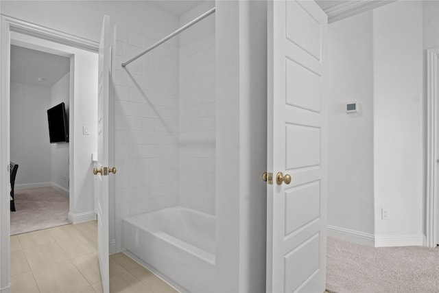 14524 Capridge Rd, Aledo, TX 76008 - bathroom featuring baseboards, shower / bath combination, and tile patterned floors