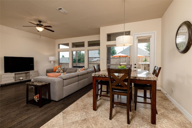 604 Carnaby Ct, Roanoke, TX 76262 - tiled dining area with ceiling fan and baseboards