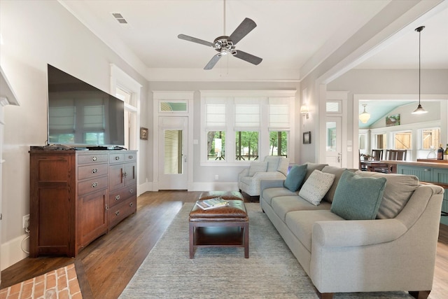 404 E Wall St, Grapevine, TX 76051 - living area featuring a ceiling fan, wood finished floors, and baseboards