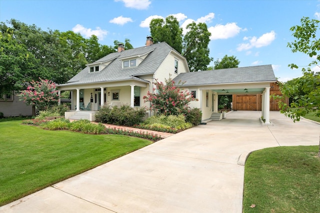 404 E Wall St, Grapevine, TX 76051 - view of front facade featuring a porch, driveway, a front yard, a carport, and a chimney