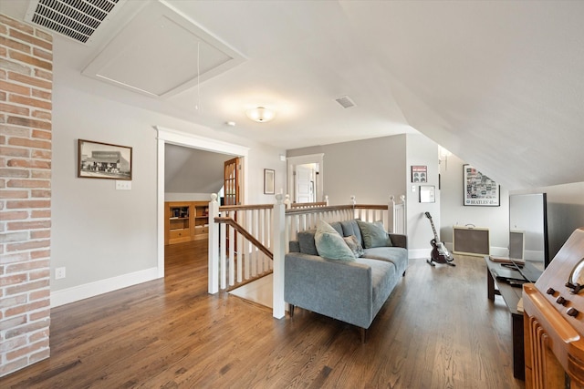 404 E Wall St, Grapevine, TX 76051 - living room with attic access, wood finished floors, baseboards, and lofted ceiling