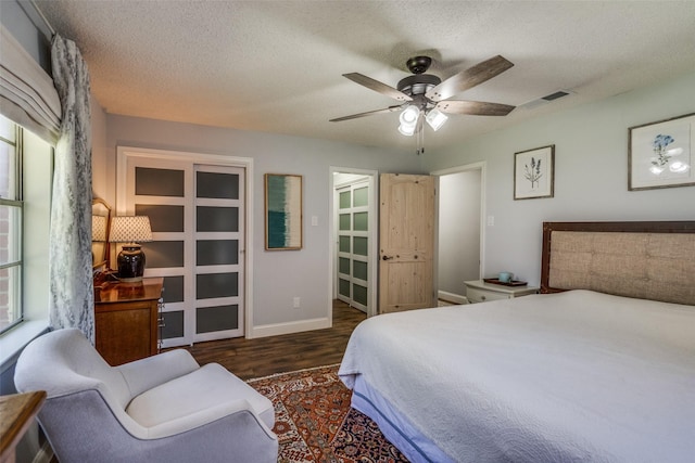 309 Westpark Dr N, Mckinney, TX 75071 - bedroom featuring wood finished floors, baseboards, a textured ceiling, and ceiling fan