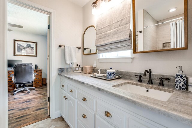 309 Westpark Dr N, Mckinney, TX 75071 - full bath featuring double vanity, a shower with shower curtain, and recessed lighting