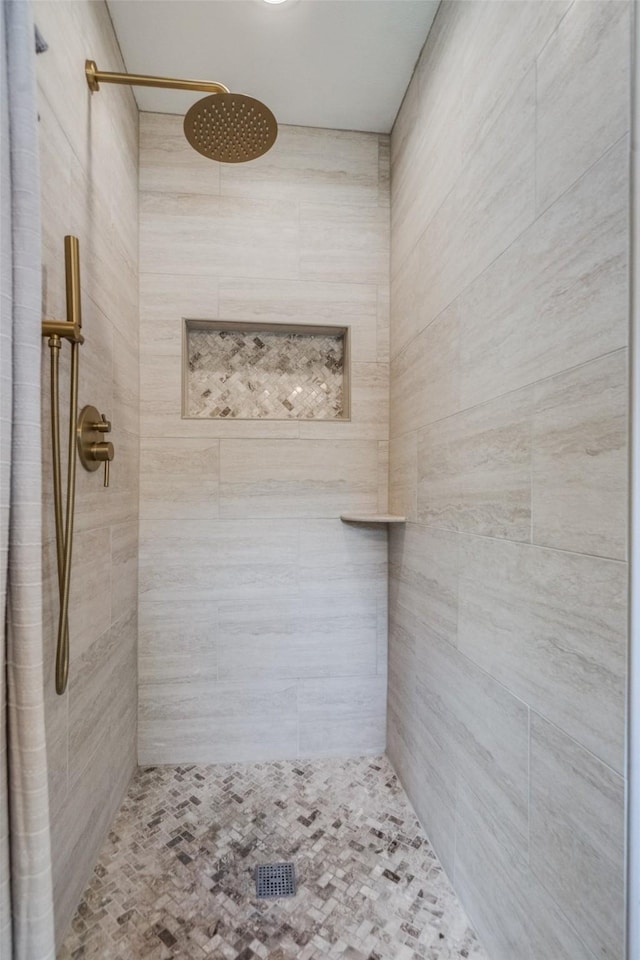 309 Westpark Dr N, Mckinney, TX 75071 - bathroom with a tile shower