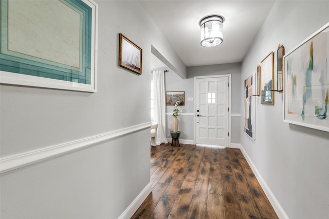 309 Westpark Dr N, Mckinney, TX 75071 - doorway featuring dark wood-type flooring and baseboards