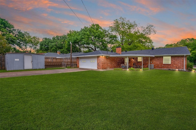 309 Westpark Dr N, Mckinney, TX 75071 - ranch-style home featuring concrete driveway, brick siding, central AC, and a chimney