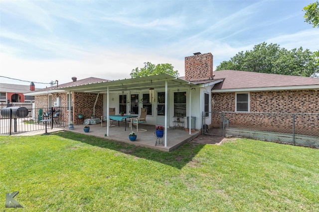 1001 Chriswood Dr, Abilene, TX 79601 - back of property featuring a chimney, a patio area, a gate, and brick siding