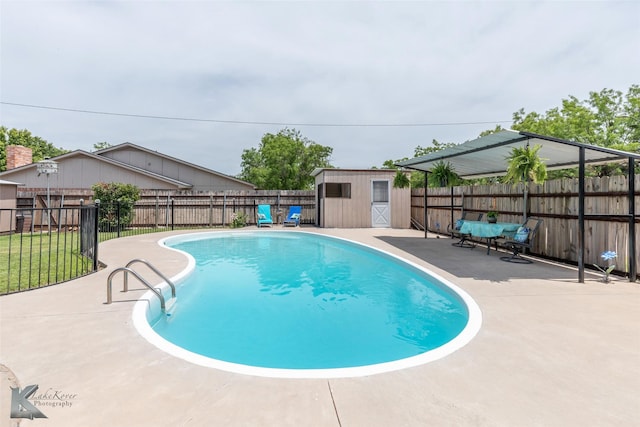 1001 Chriswood Dr, Abilene, TX 79601 - view of pool featuring a patio area, a fenced backyard, a shed, and an outdoor structure