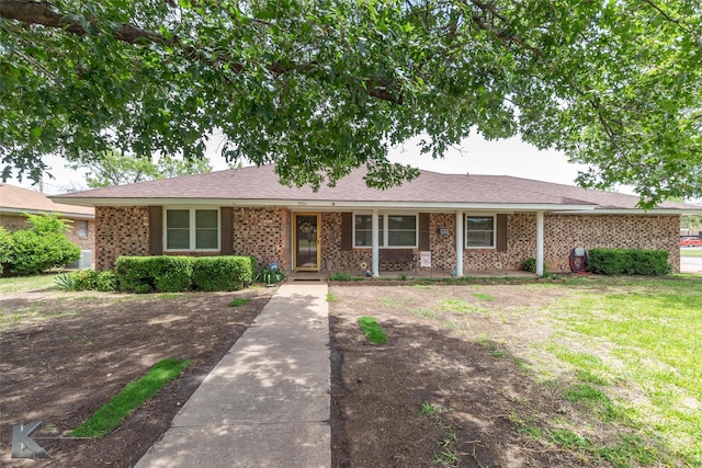 1001 Chriswood Dr, Abilene, TX 79601 - ranch-style home featuring a front lawn and brick siding