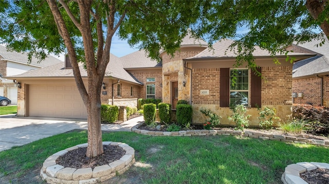 4209 Autumn Path Rd, Denton, TX 76208 - view of front of property with brick siding, concrete driveway, a garage, roof with shingles, and a front lawn