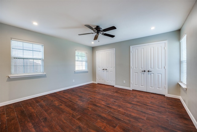10627 Mccree Rd, Dallas, TX 75238 - unfurnished bedroom with wood finished floors, multiple closets, baseboards, recessed lighting, and ceiling fan