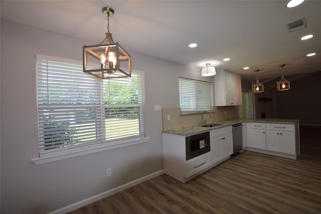 7921 Oak Pkwy, Burleson, TX 76028 - kitchen with stainless steel dishwasher, a chandelier, dark wood finished floors, white cabinetry, and a sink