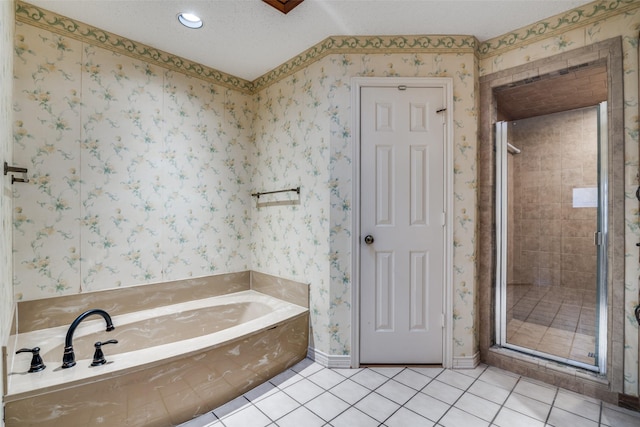3506 Carla Dr, Rowlett, TX 75088 - full bath with a stall shower, tile patterned flooring, a bath, wallpapered walls, and baseboards