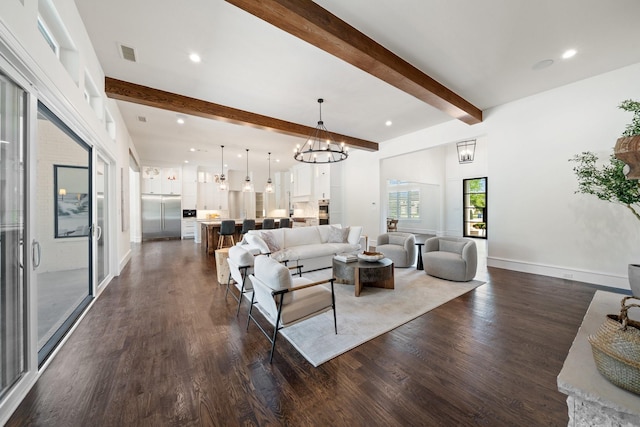 2012 Honey Ln, Celina, TX 75009 - living room with beamed ceiling, dark wood-style floors, a chandelier, recessed lighting, and baseboards