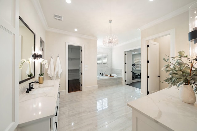 2012 Honey Ln, Celina, TX 75009 - bathroom with crown molding, a chandelier, vanity, a bath, and a walk in closet
