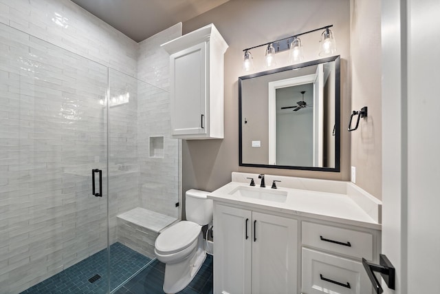 2012 Honey Ln, Celina, TX 75009 - full bath featuring a shower stall, toilet, vanity, tile patterned floors, and a ceiling fan