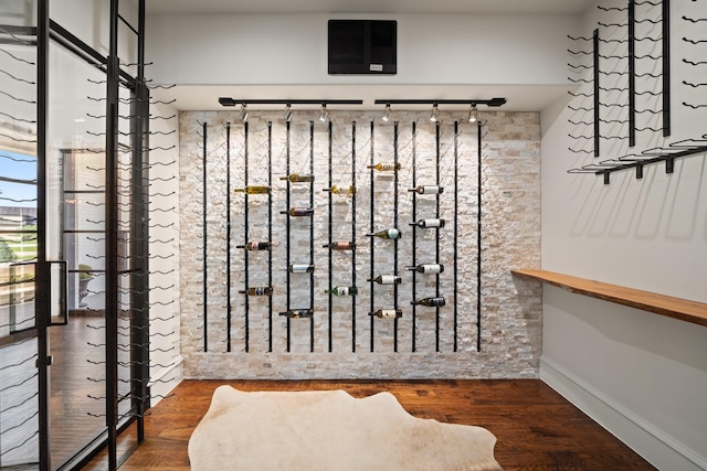 2012 Honey Ln, Celina, TX 75009 - wine room featuring rail lighting and wood finished floors