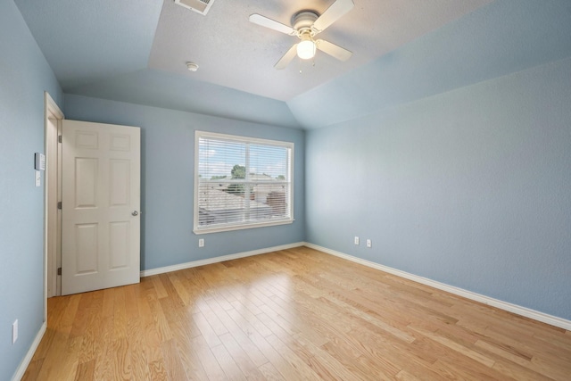 8808 Eastwood Ave, Cross Roads, TX 76227 - unfurnished bedroom featuring light wood-style floors, vaulted ceiling, baseboards, and a ceiling fan