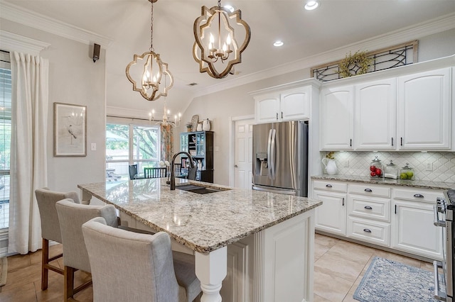 725 Bluebird St, Fort Worth, TX 76140 - kitchen featuring stainless steel fridge with ice dispenser, a chandelier, a sink, backsplash, and light stone countertops