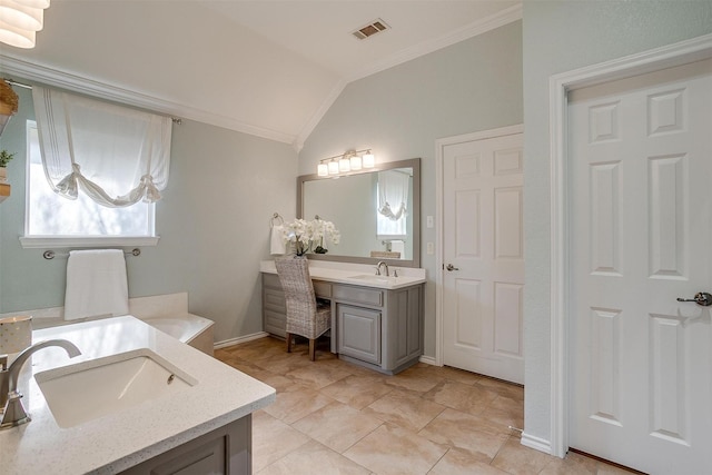 725 Bluebird St, Fort Worth, TX 76140 - bathroom featuring ornamental molding, two vanities, vaulted ceiling, and baseboards