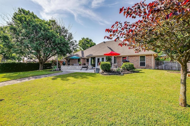 725 Bluebird St, Fort Worth, TX 76140 - back of property featuring a patio and brick siding