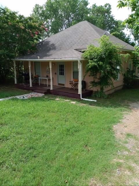 301 Dogwood Ave, Princeton, TX 75407 - view of front of house with covered porch and a front yard